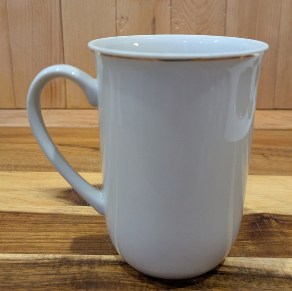 White Ceramic Mug with Blue and Brown Design - Picture 4 of 8